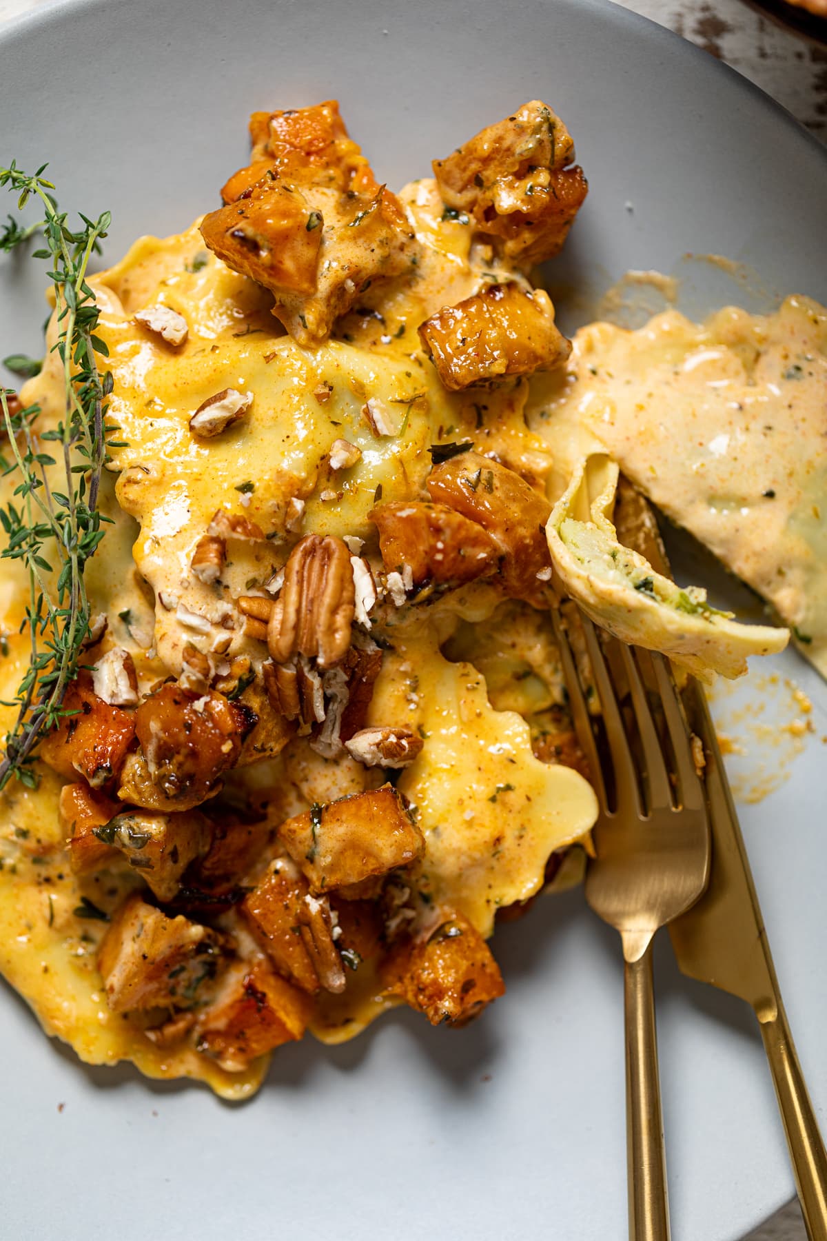 Closeup of a plate of Ravioli with Parmesan Garlic Sauce