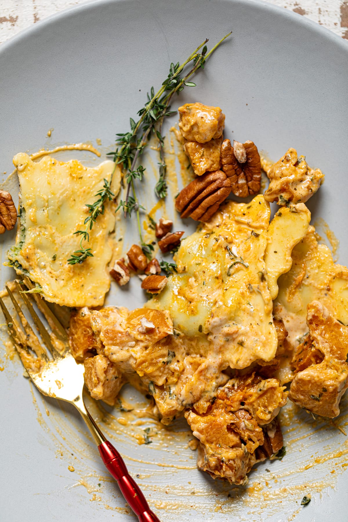 Fork in Ravioli with Parmesan Garlic Sauce