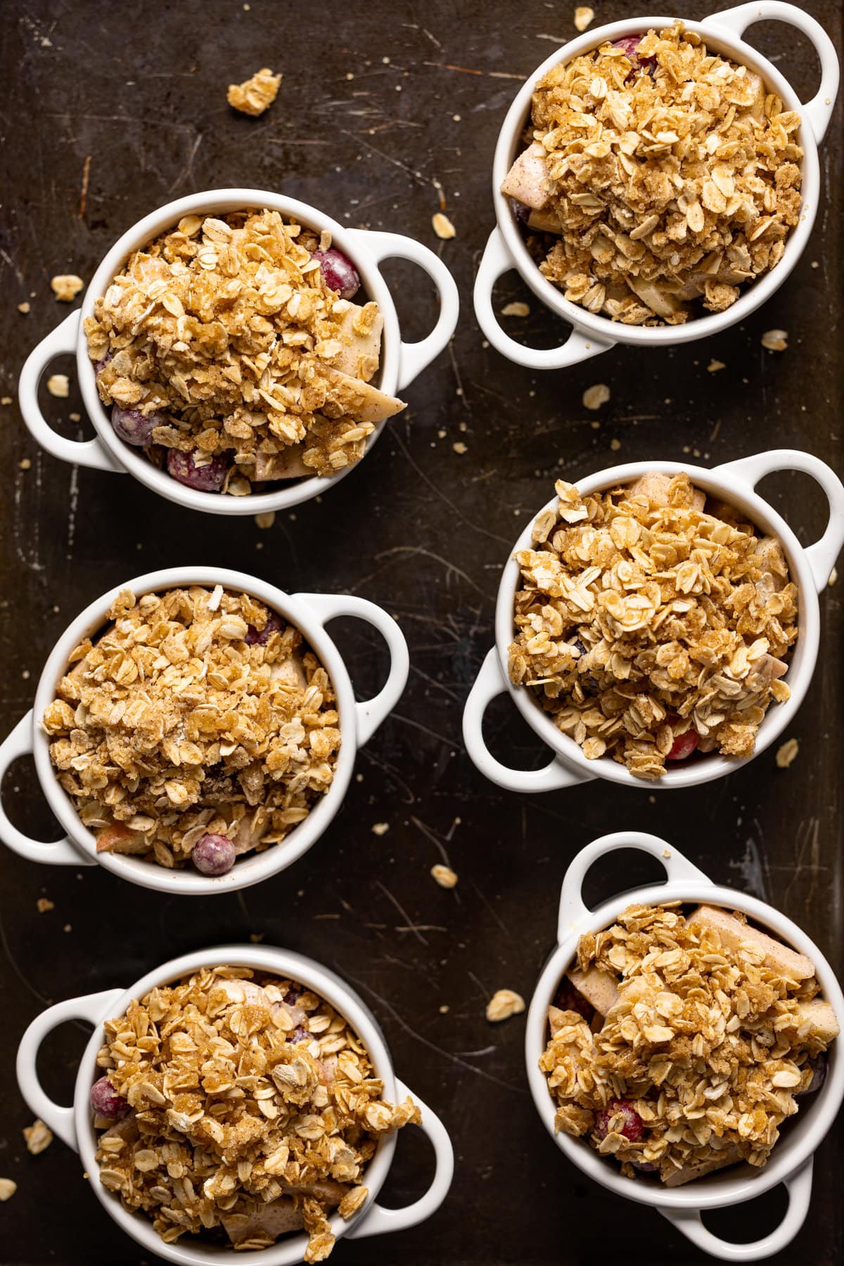 Overhead shot of several uncooked Vegan Apple Cranberry Crisps