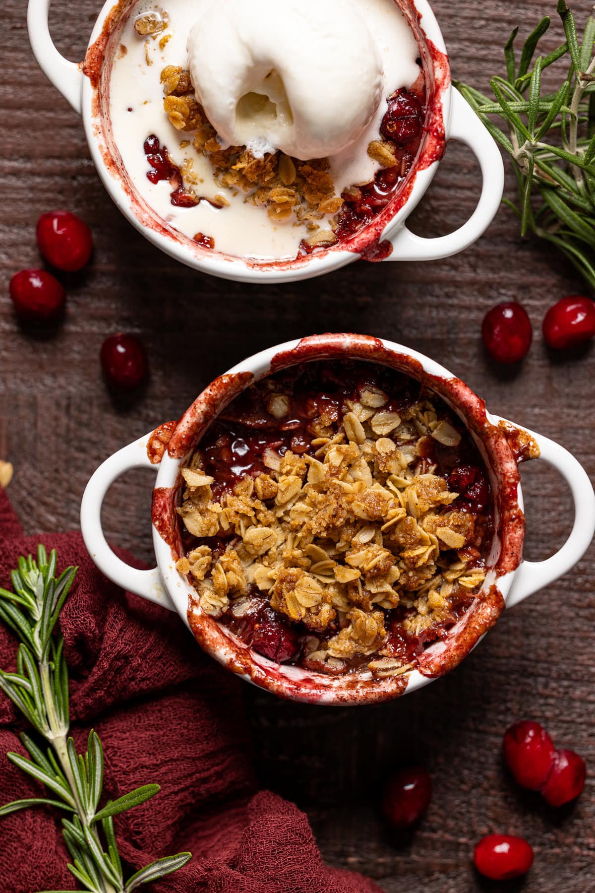 Overhead shot of a Vegan Apple Cranberry Crisp in a handled bowl