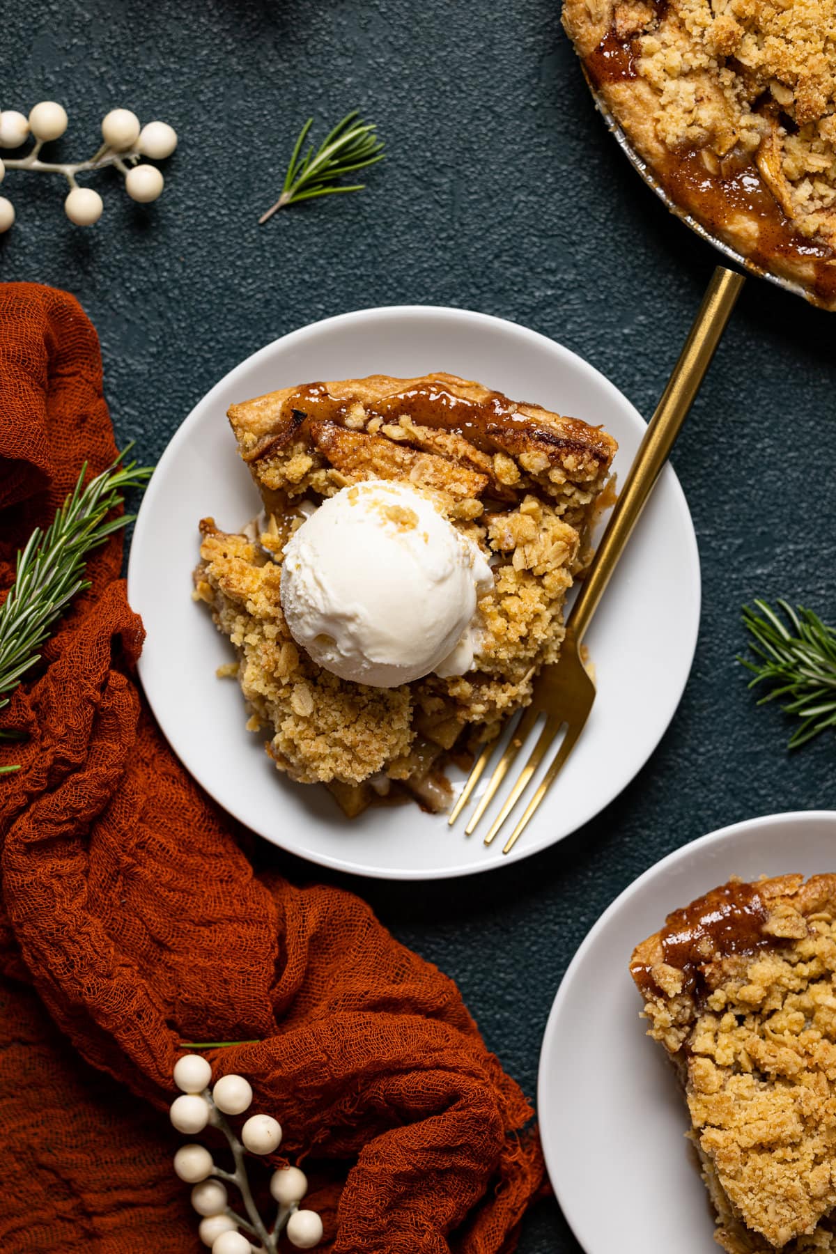 Overhead shot of a slice of Dutch Apple Pie topped with ice cream