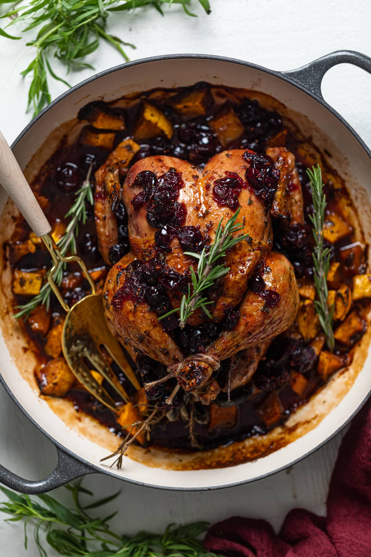 Cranberry Maple Roast Chicken in a Dutch oven