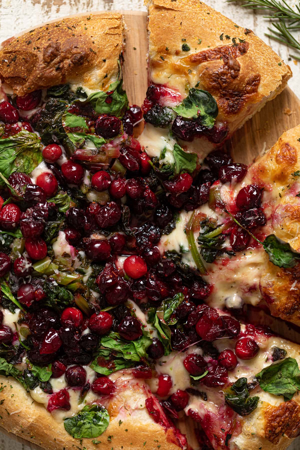 Closeup of a partially-sliced Thanksgiving Pizza