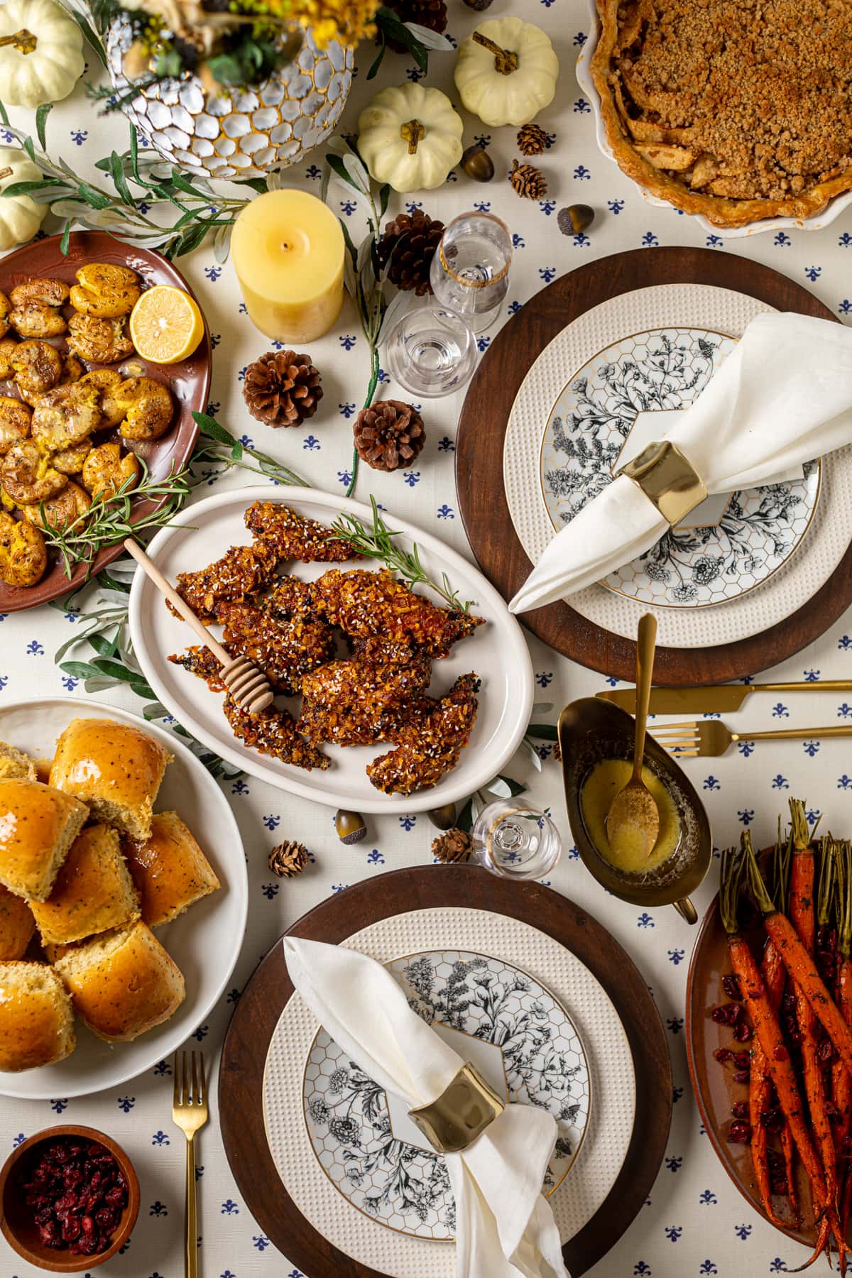 Table set with Thanksgiving foods and decorations