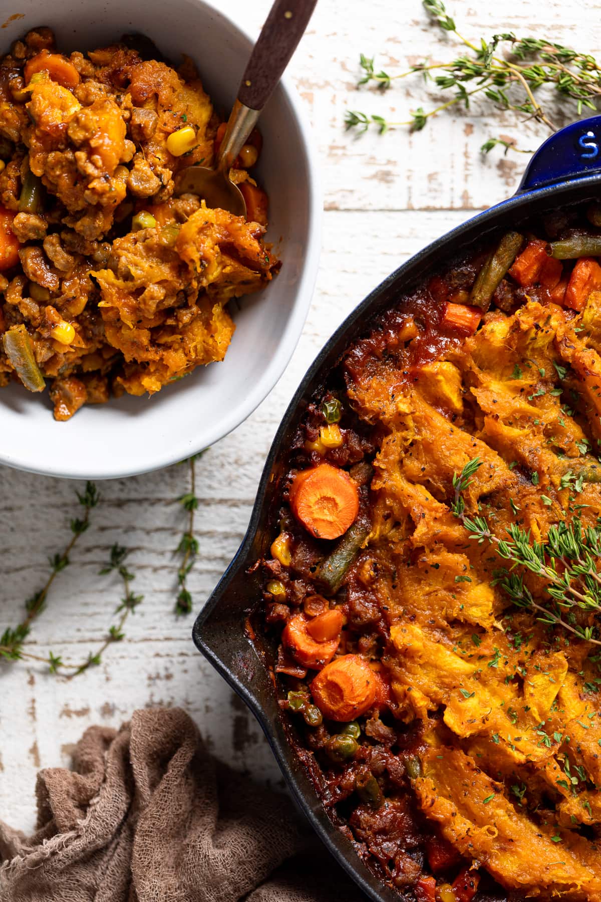 Butternut Squash Sweet Potato Shepherd’s Pie in a bowl and in a skillet