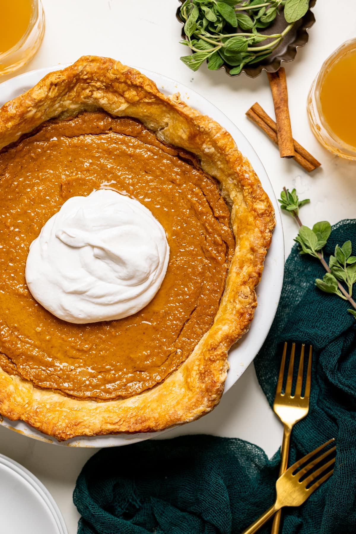 Overhead shot of Vegan Sweet Potato Pie topped with coconut whipped cream