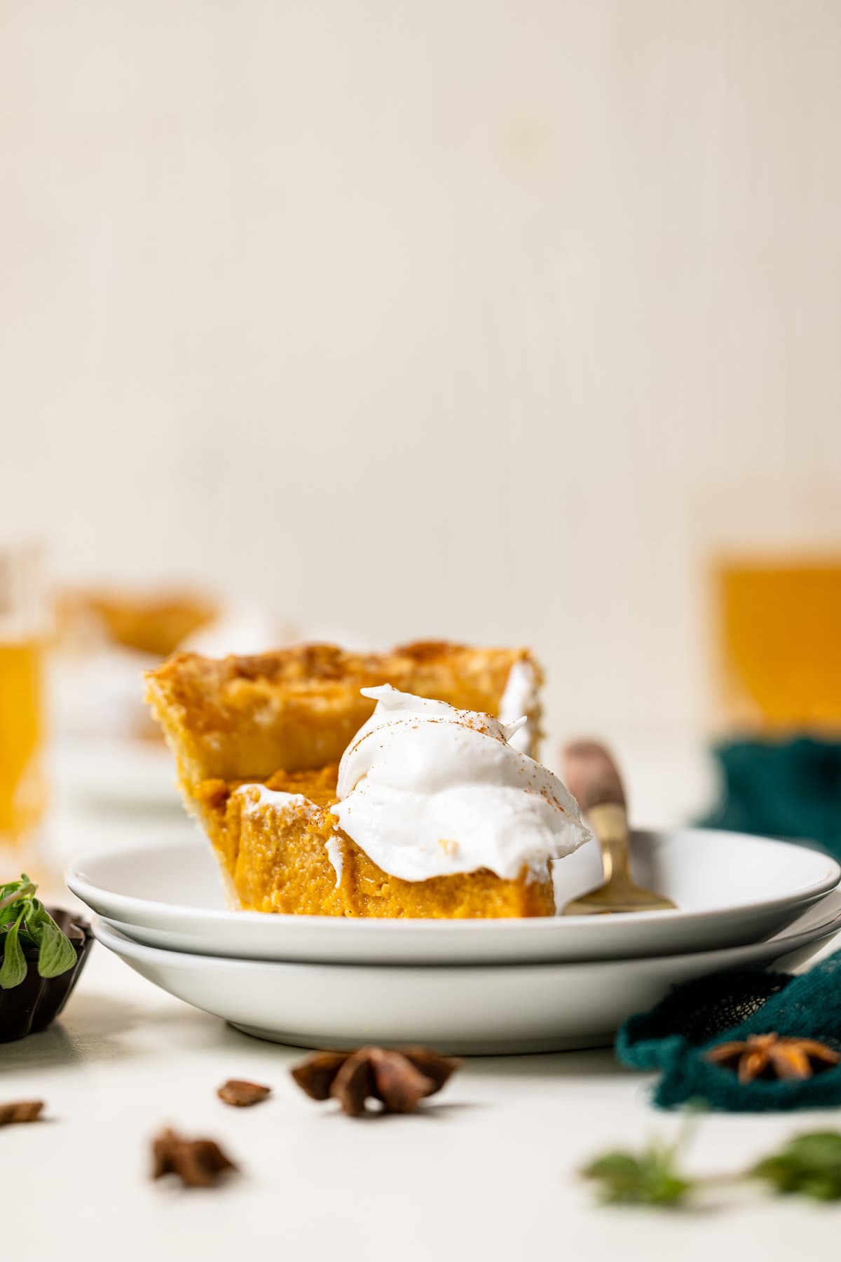 Slice of vegan Sweet Potato Pie on two plates with a fork