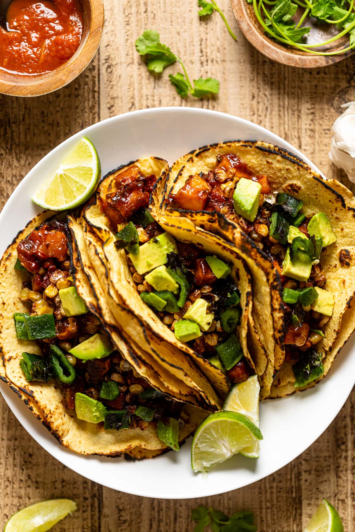 Overhead shot of three Chipotle Barbeque Butternut Squash Tacos on a plate