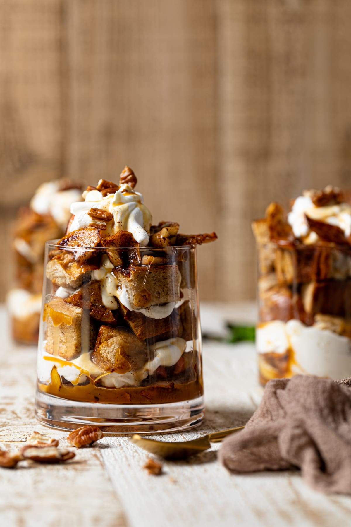 Two Caramel Apple French Toast Parfaits in glasses