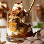 Caramel Apple French Toast Parfait in a glass with a spoon