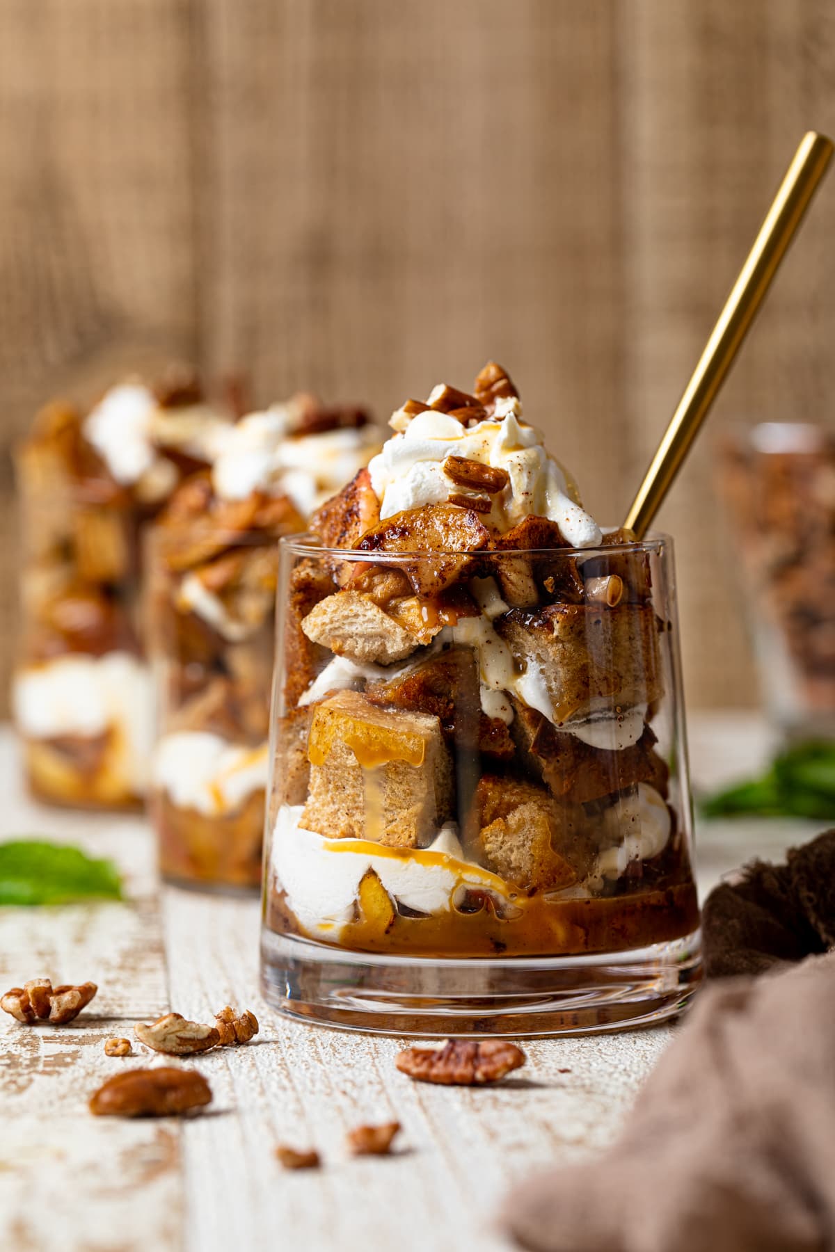 Line of Caramel Apple French Toast Parfaits in glasses