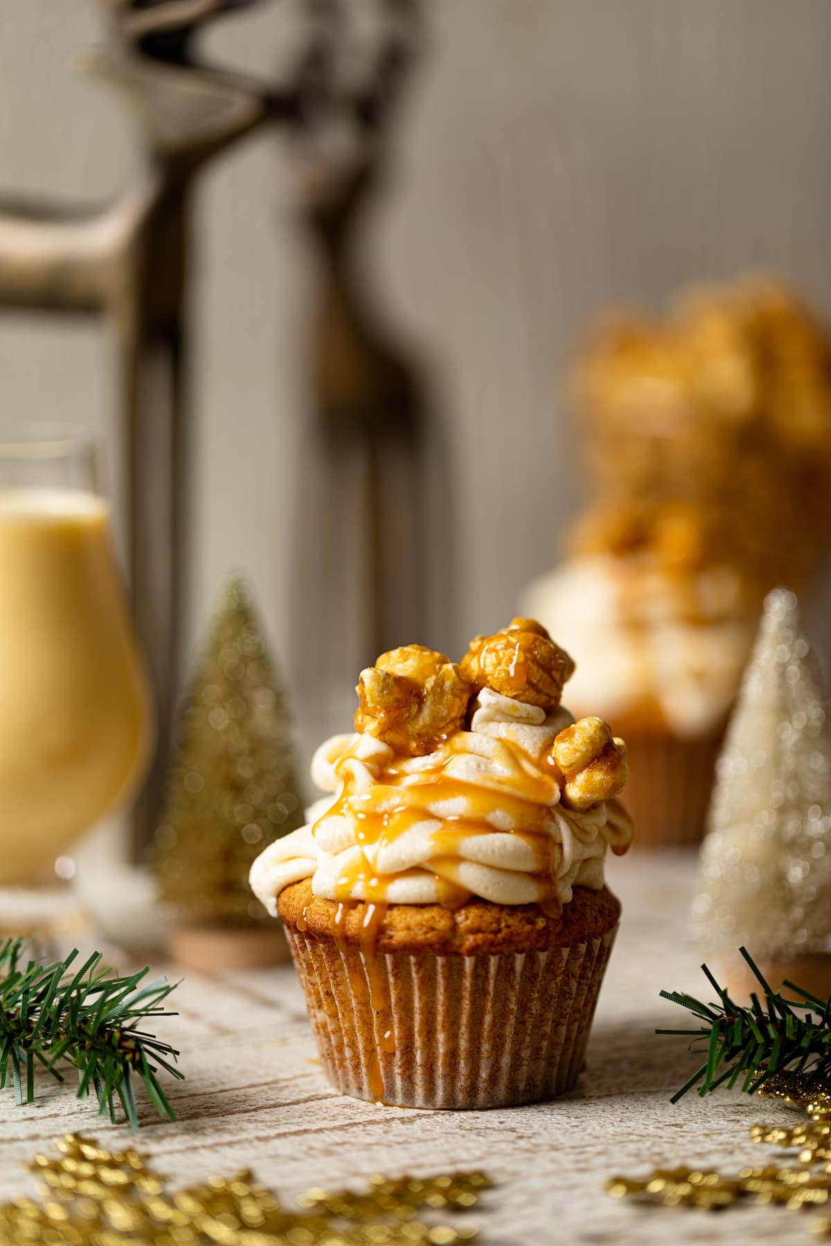 Caramel Eggnog Cupcake topped with caramel popcorn