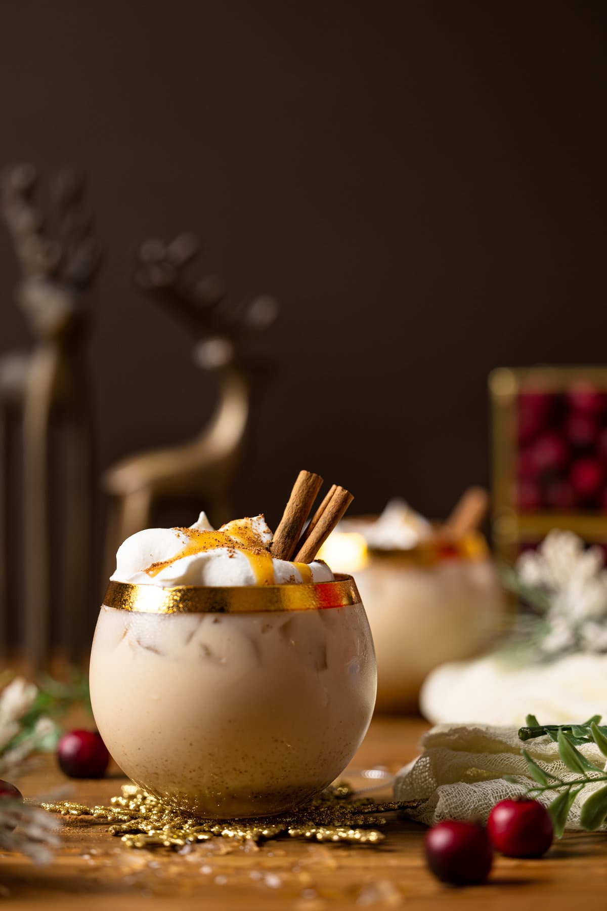 Vegan Caramel Eggnog Mocktail in a gold-rimmed glass