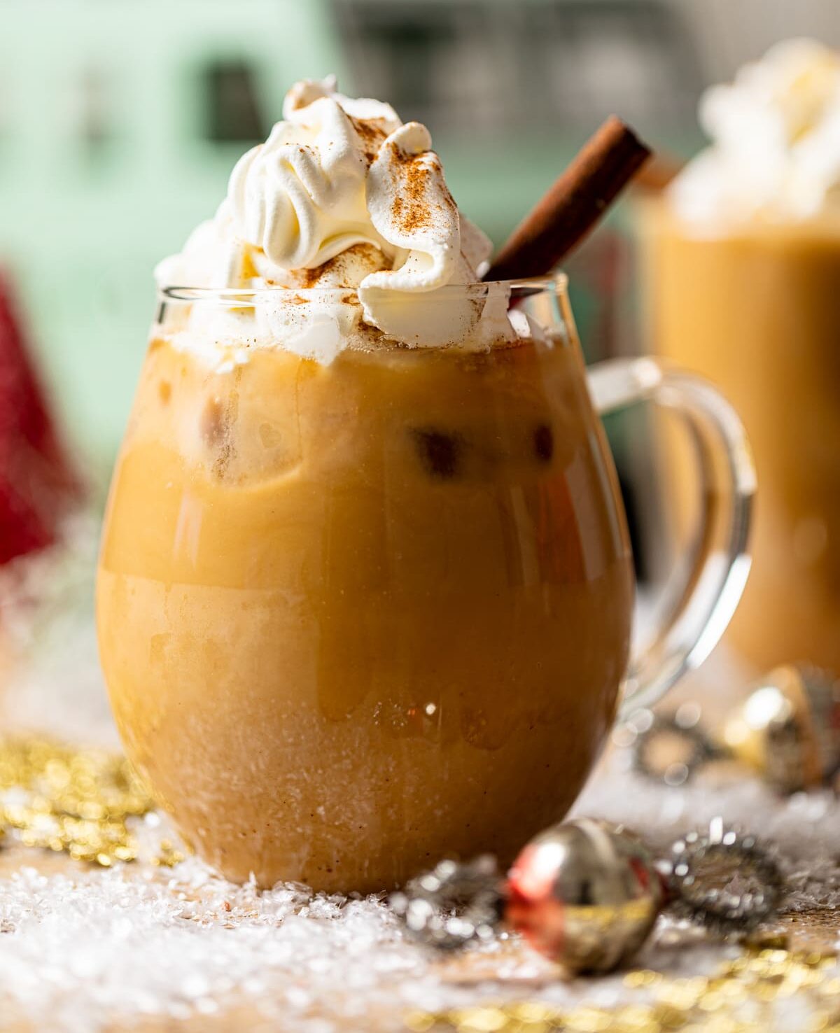 Iced Maple Cinnamon Oat Latte in a glass mug