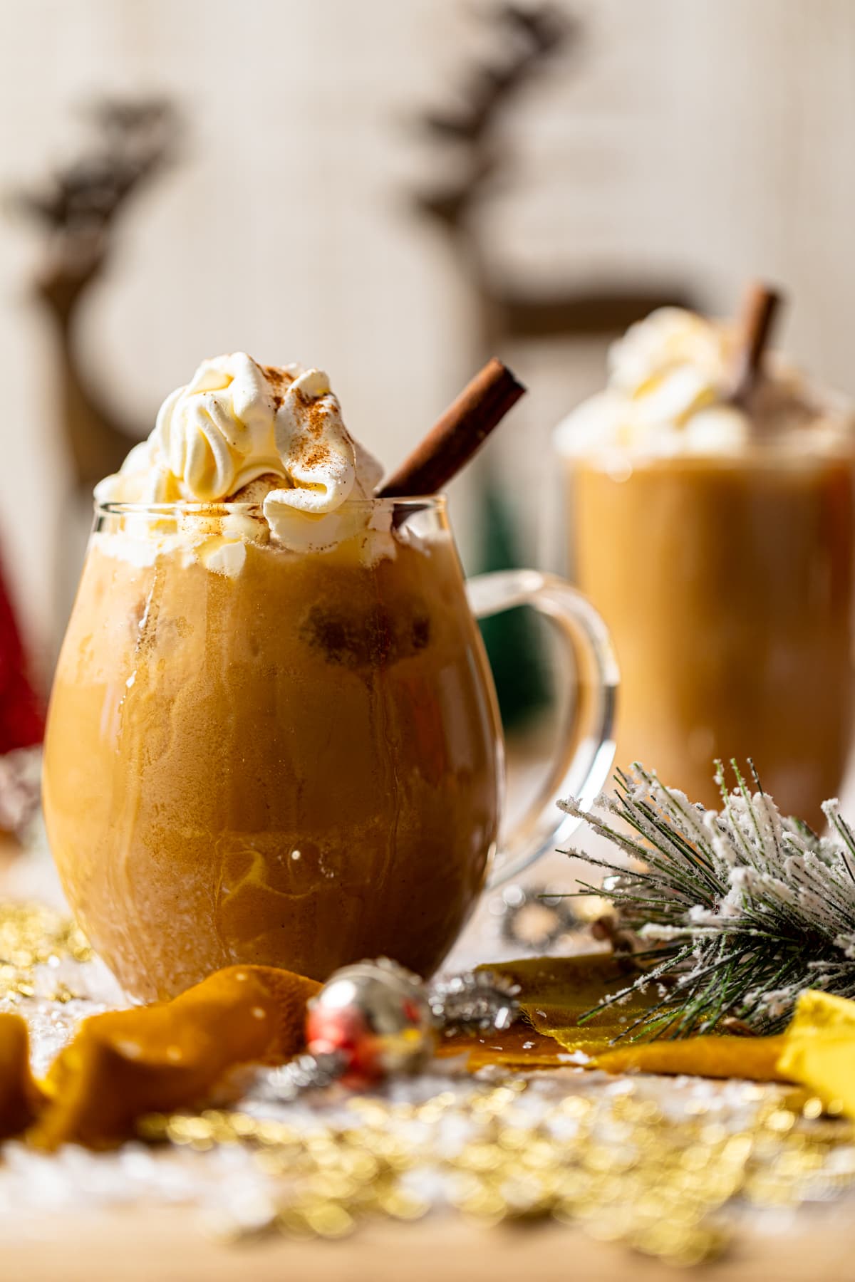 Iced Maple Cinnamon Oat Latte in a glass mug