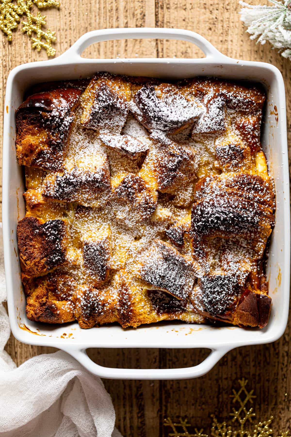 Overhead shot of Baked Eggnog French Toast in a baking dish