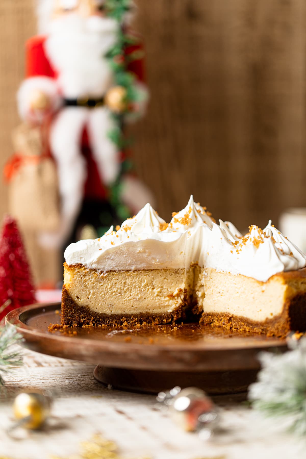 Eggnog Cheesecake with Snickerdoodle Crust missing some slices