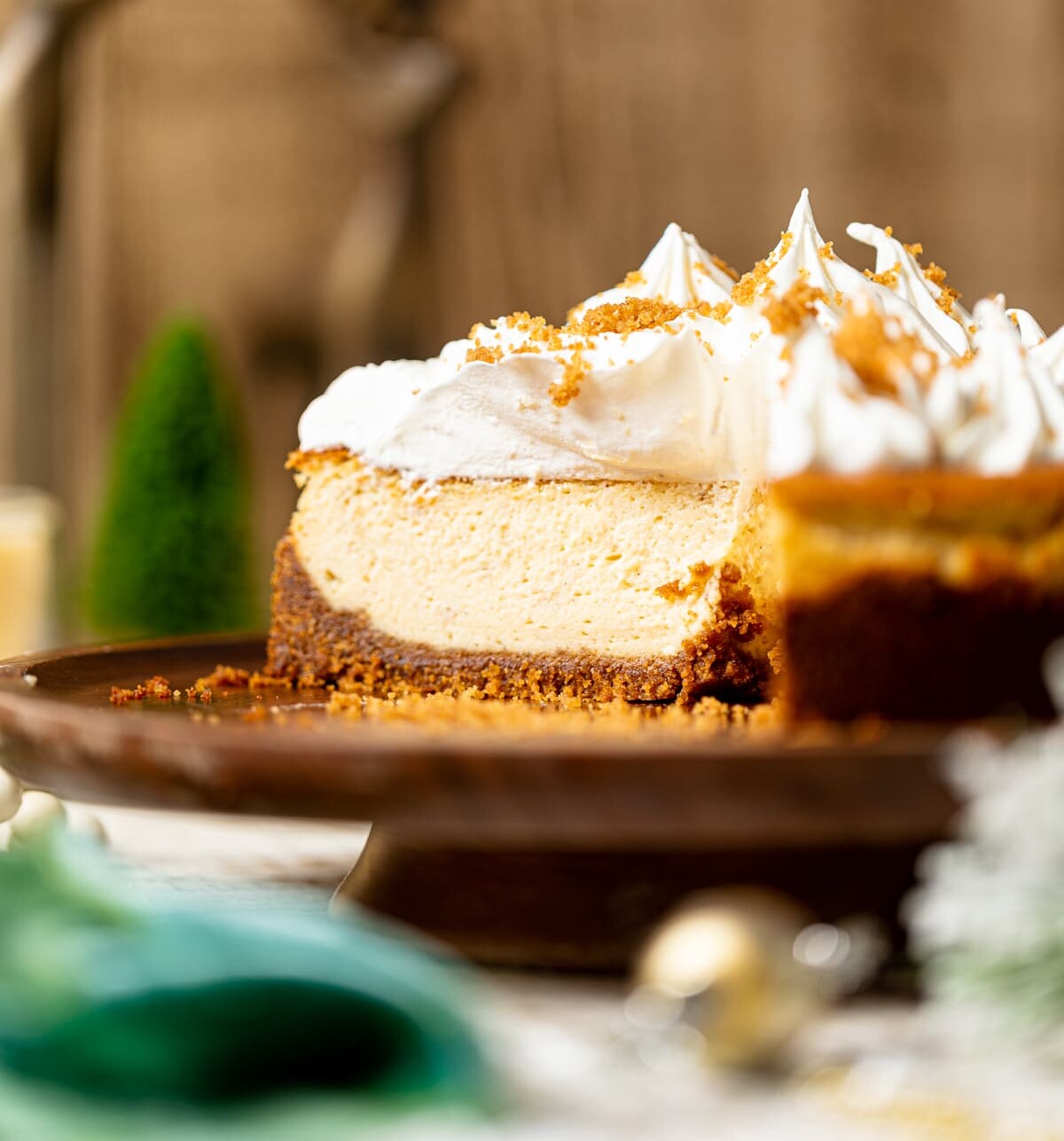 Eggnog Cheesecake with Snickerdoodle Crust missing a few slices