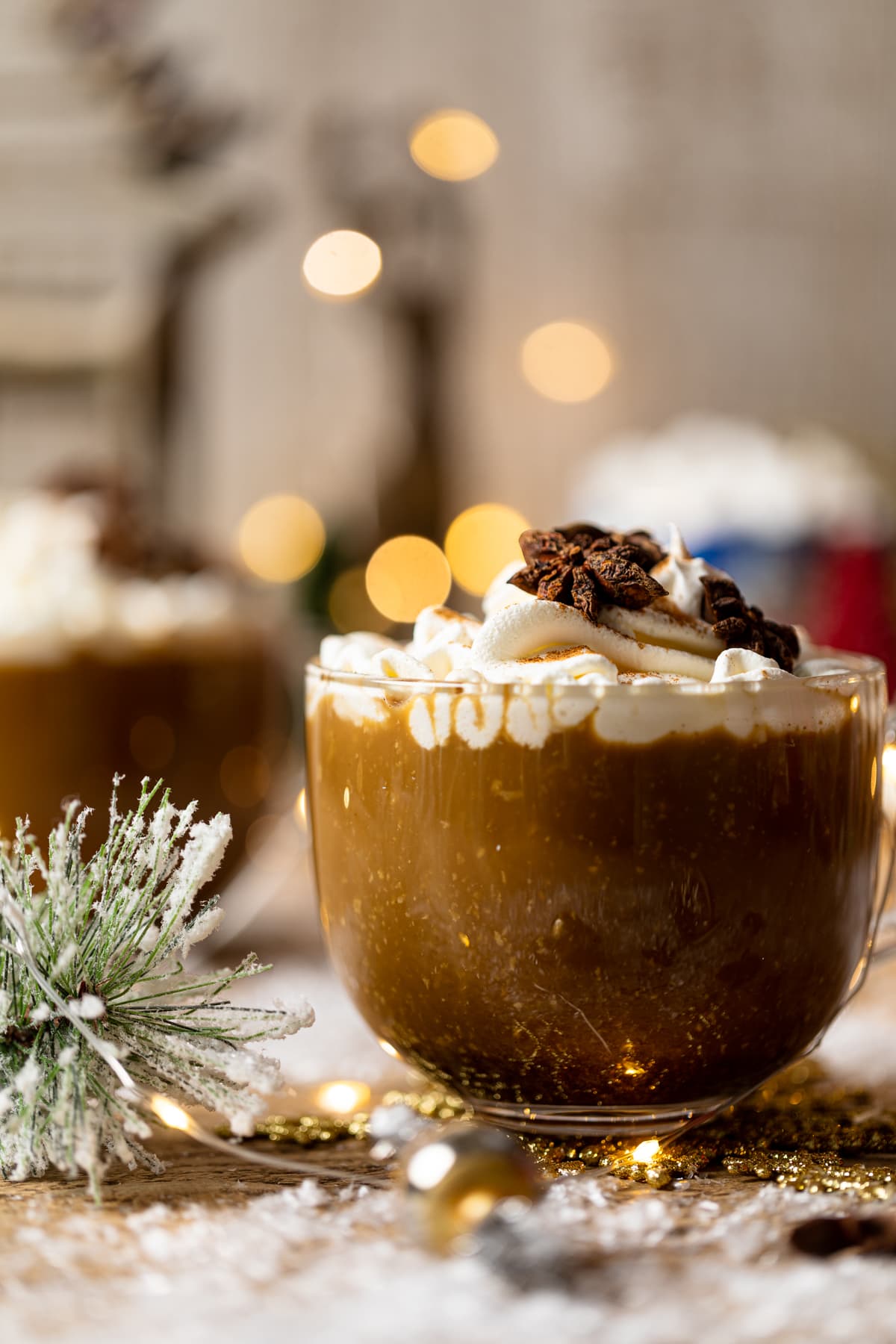 Vegan Gingerbread Latte topped with coconut whipped cream