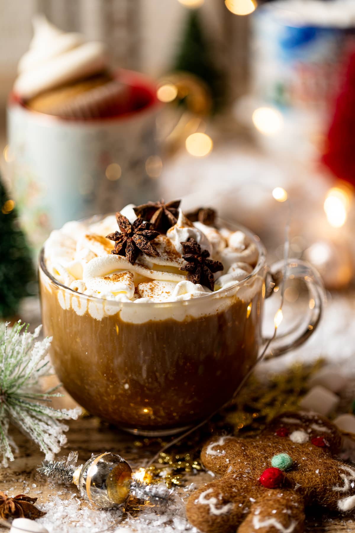 Vegan Gingerbread Latte in a large glass mug and topped with coconut whipped cream