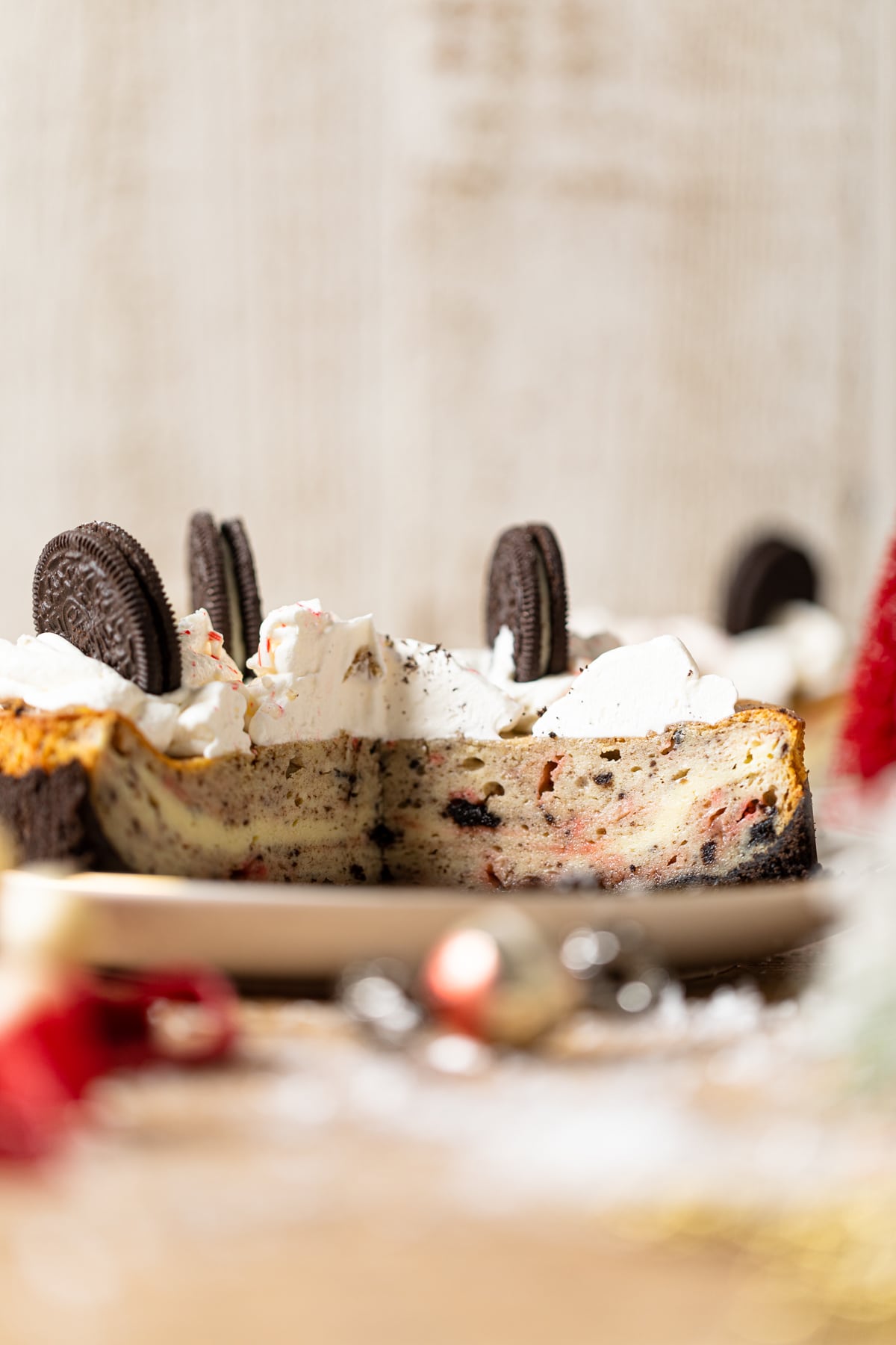 Peppermint Oreo Cheesecake missing a slice