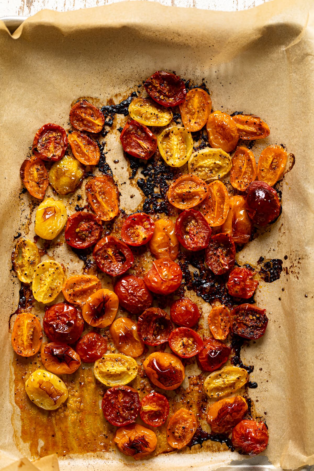 Roasted tomatoes on parchment paper
