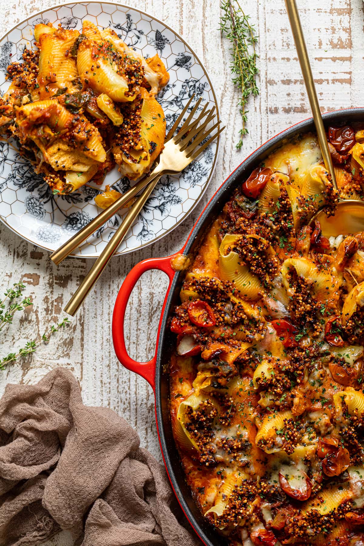 Overhead shot of a pan and plate of Butternut Squash Stuffed Shells with Quinoa and Kale