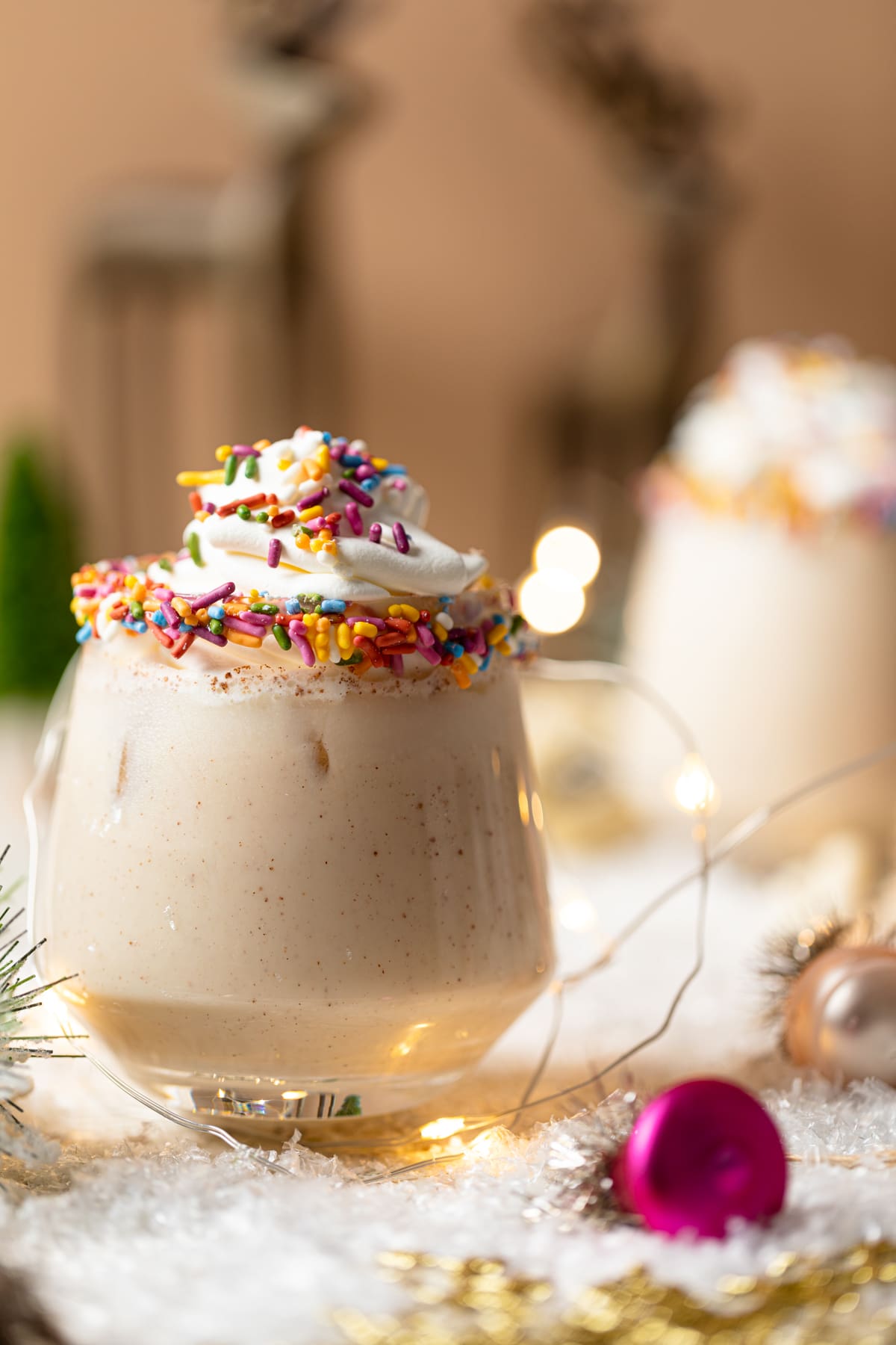 Sugar Cookie Mocktail topped with whipped cream and sprinkles