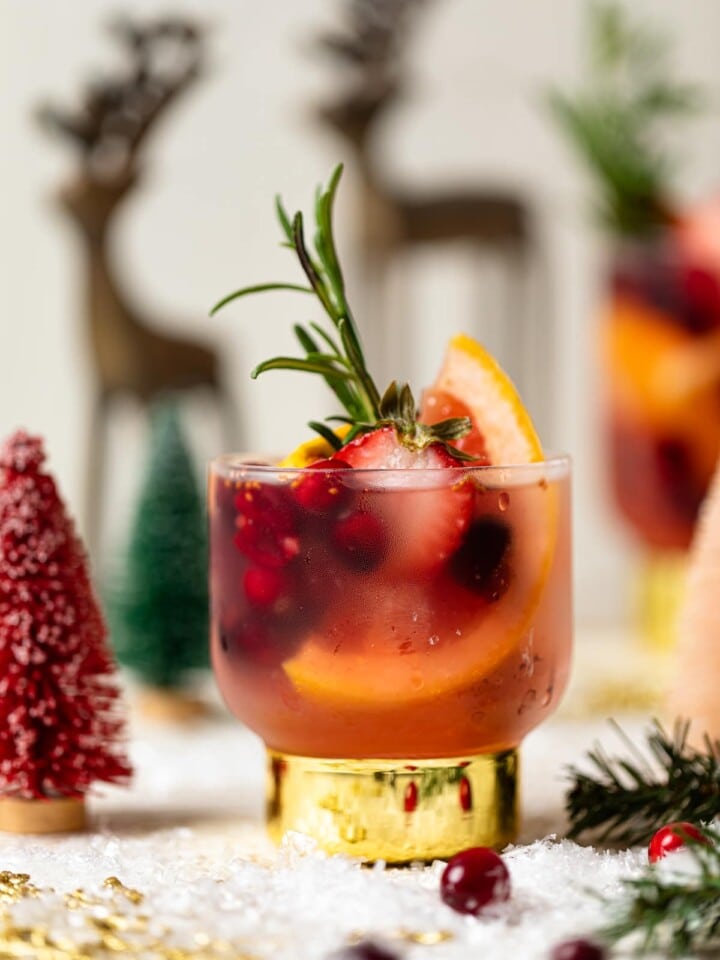 Holiday Mocktail in a small glass with a golden base