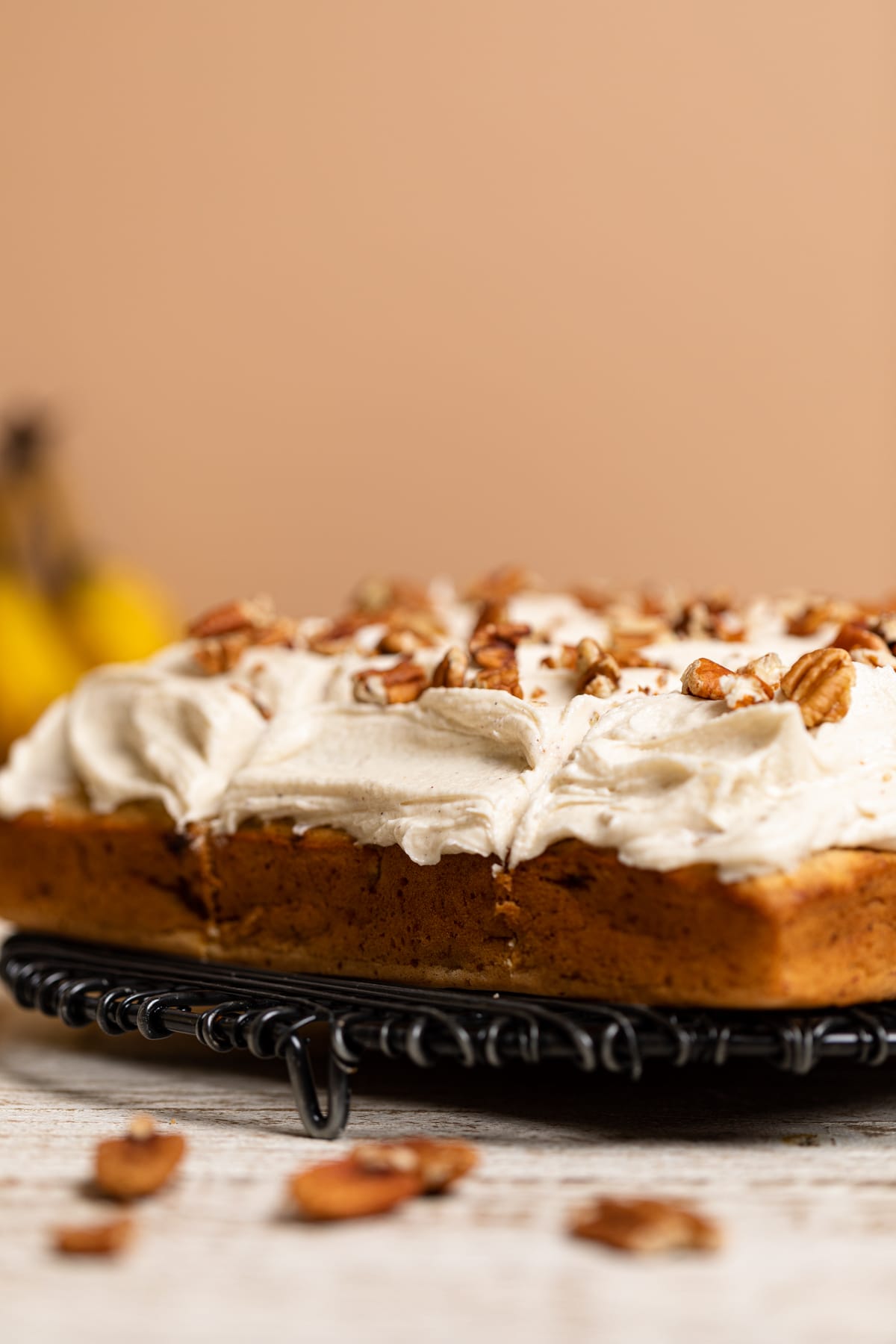 Sliced Vegan Cake recipe on a wire serving platter