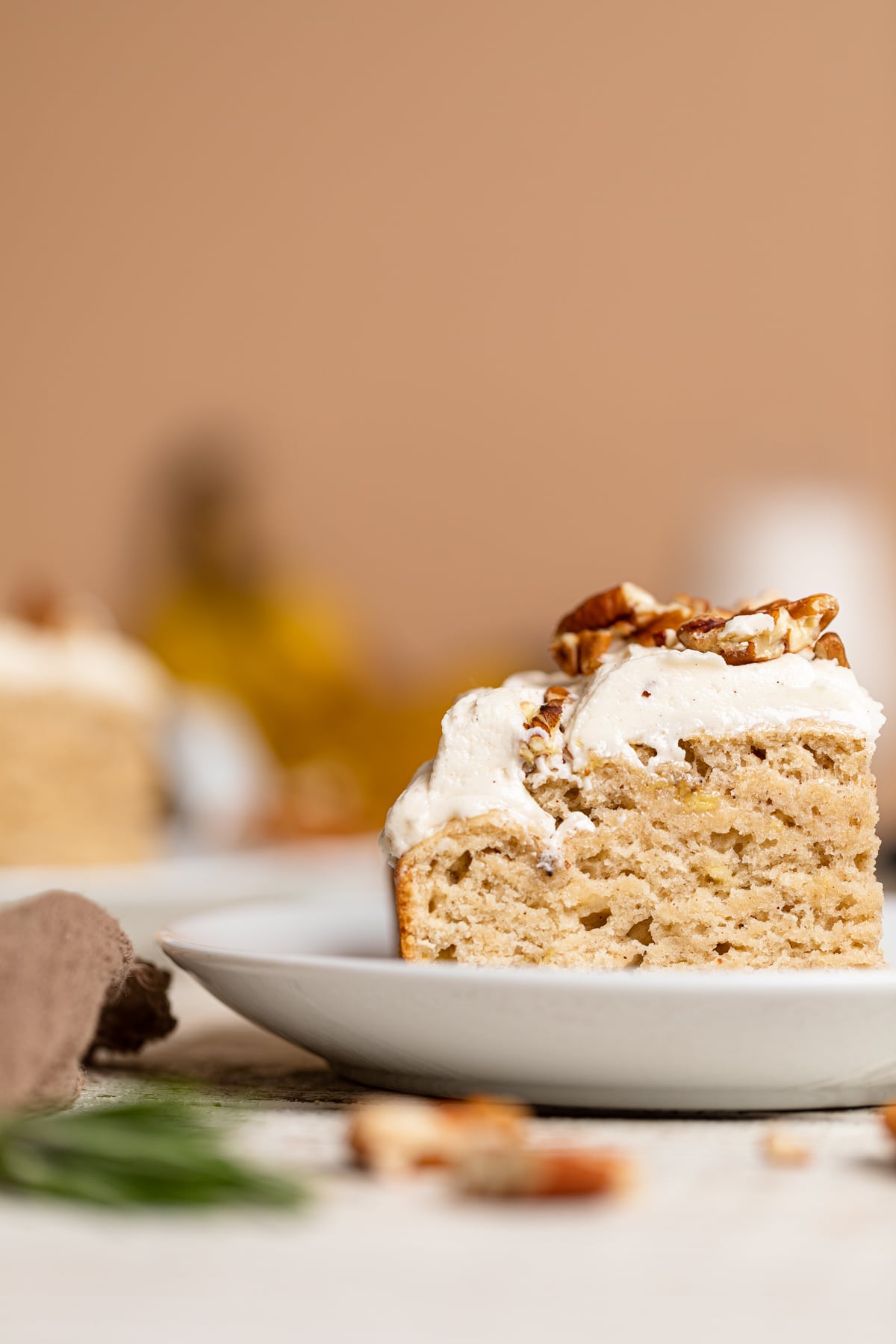 Piece of Banana Oatmeal Sheet Cake on a small plate