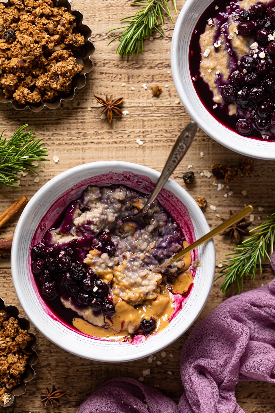 Overhead shot of bowls of Maple Blueberry Oatmeal Porridge