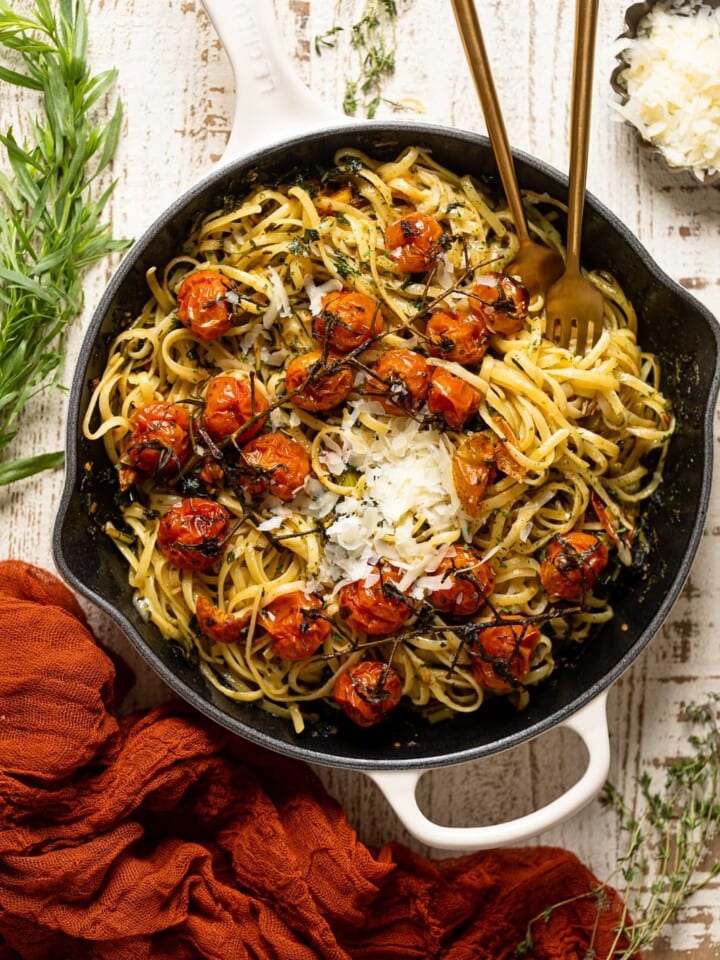 Two forks in a skillet of Bruschetta Pasta with Parmesan