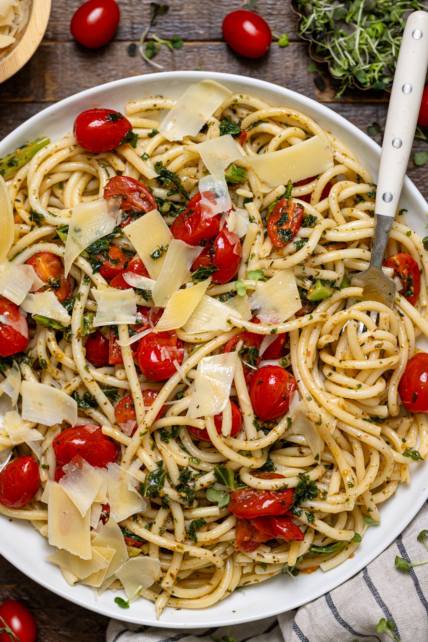 Up close shot of Easy Bruschetta Pasta with Parmesan in a serving platter.