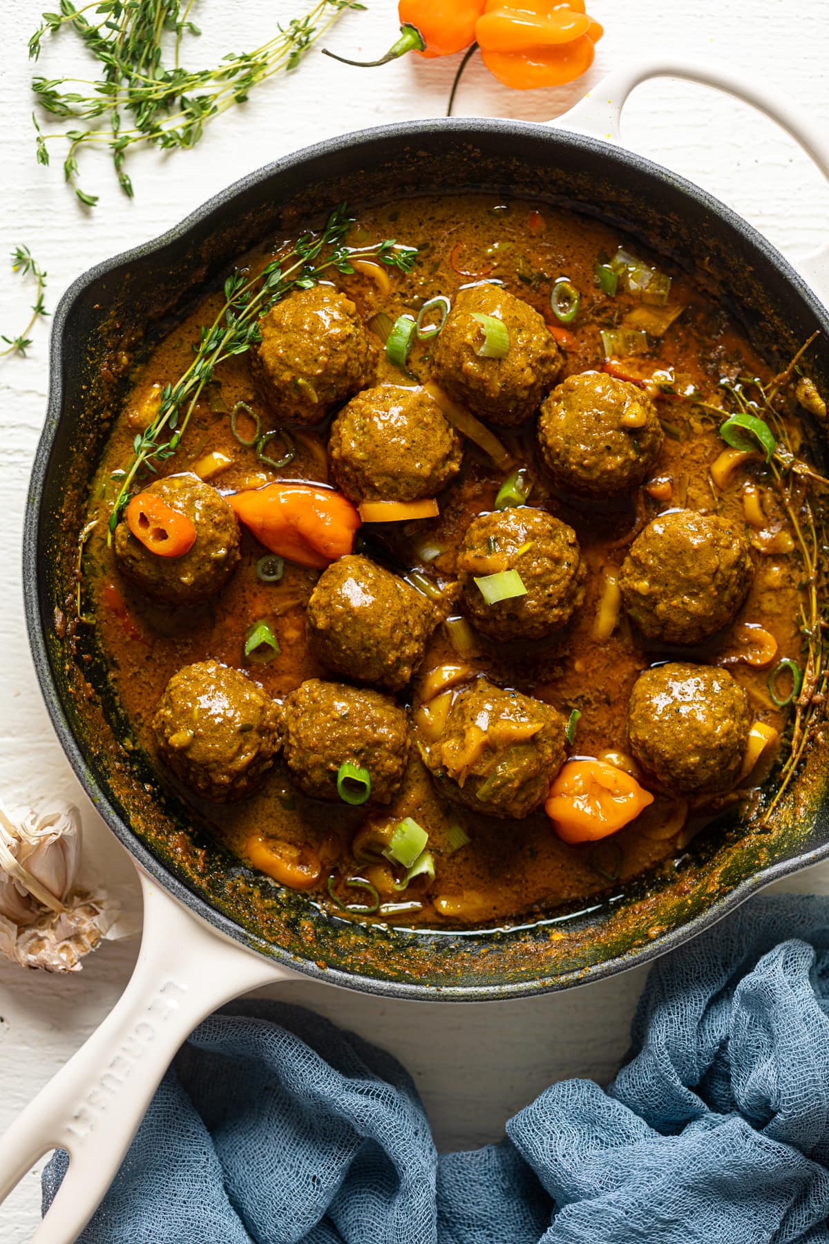 Spicy Curry Vegan Meatballs in a skillet