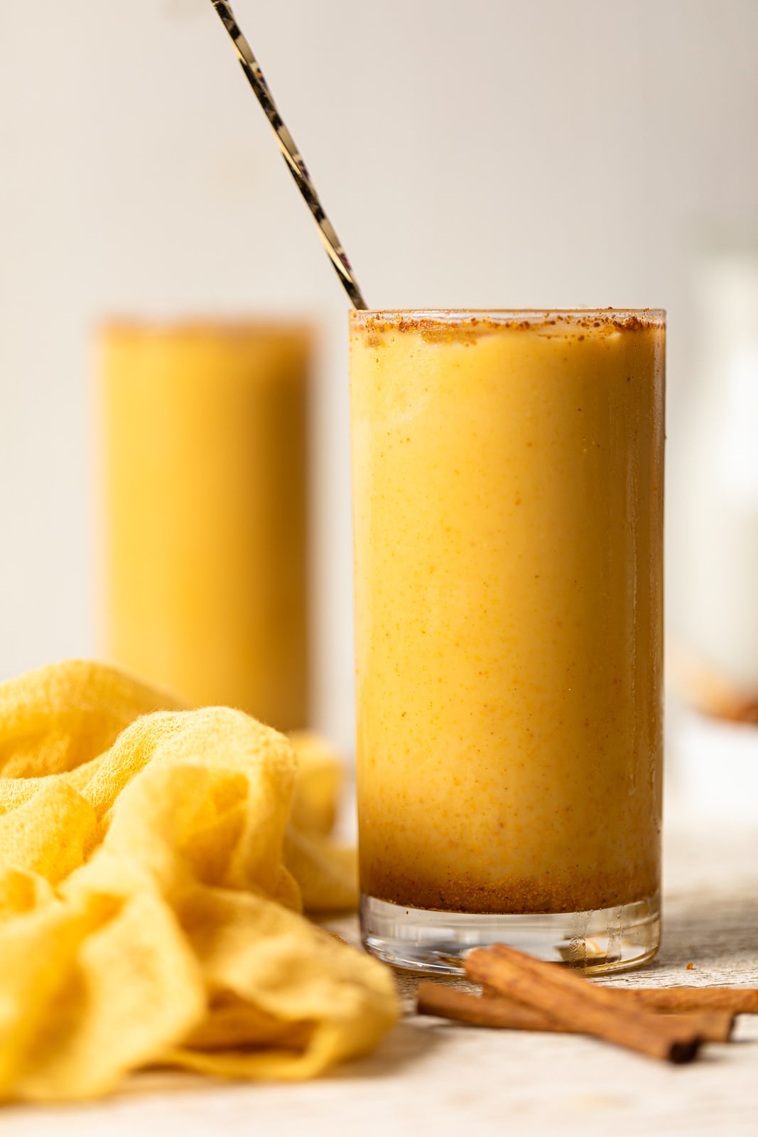 Honey and Turmeric Iced Latte in a tall glass