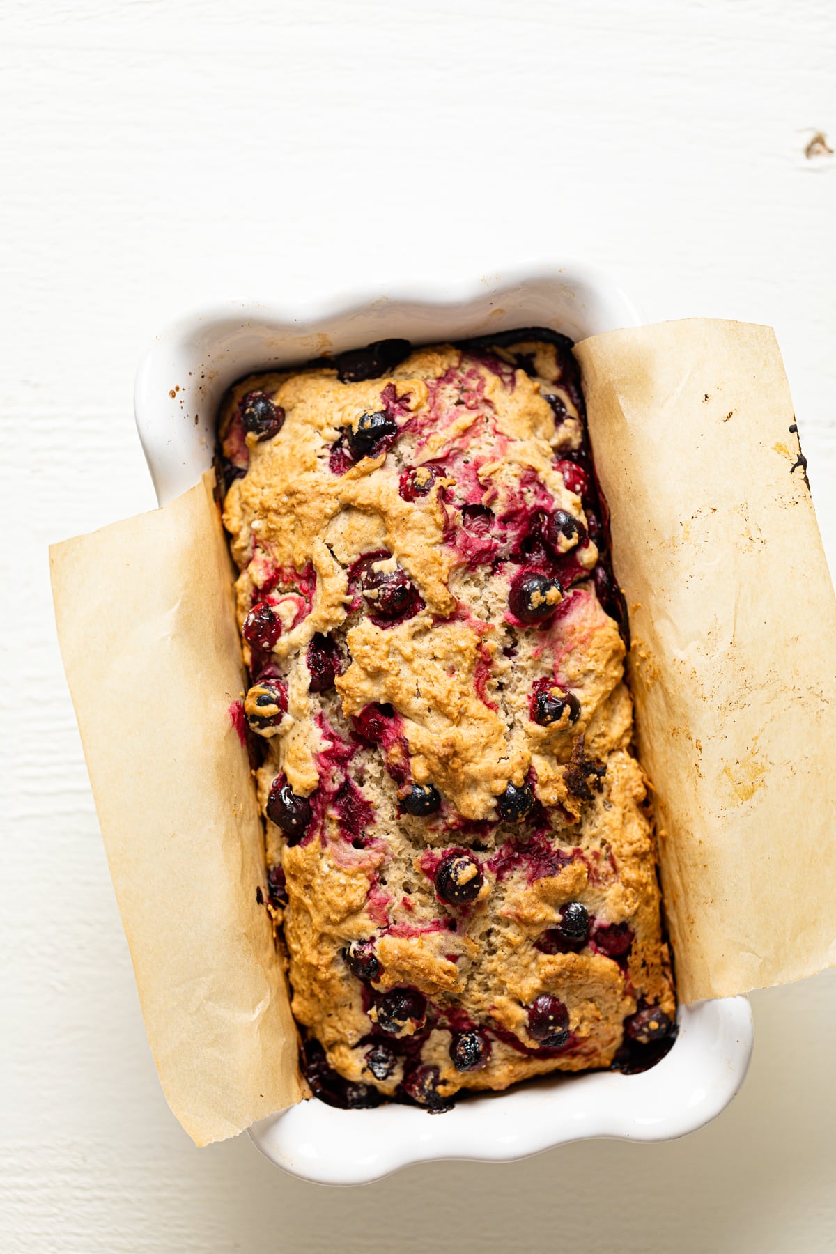 Loaf of Vegan Orange Cranberry Bread in a bread pan