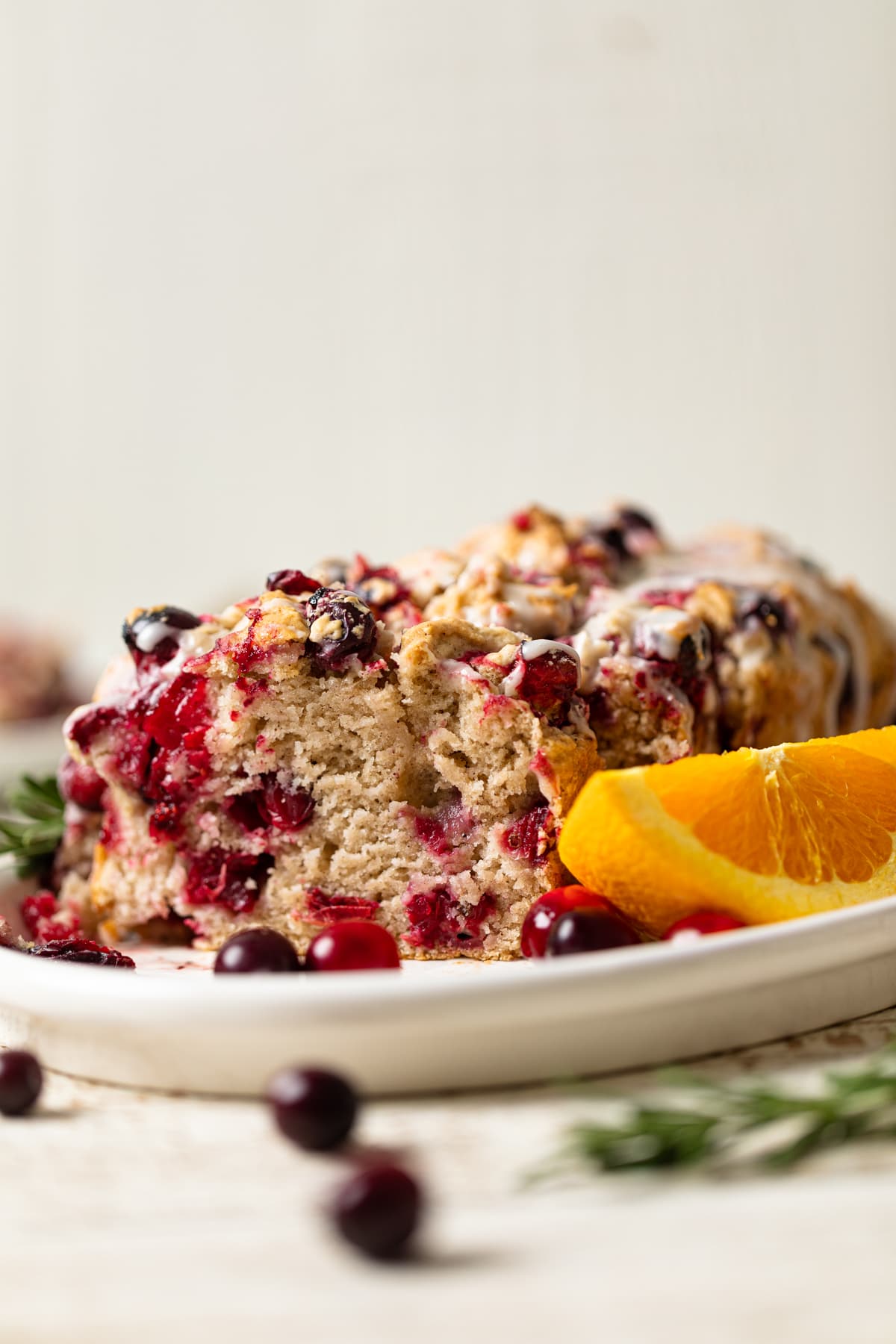 Loaf of Vegan Orange Cranberry Bread with an end sliced off