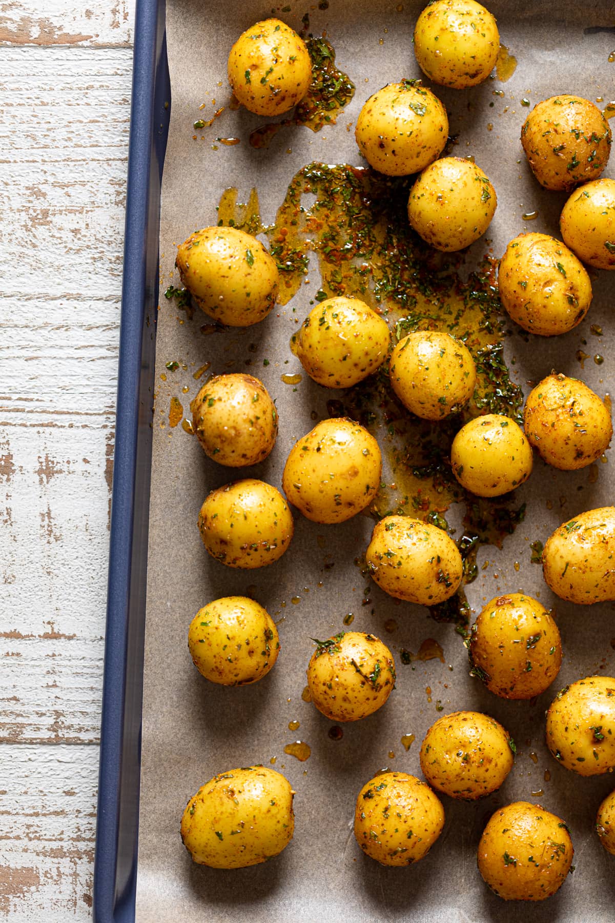 Garlic Herb Potatoes on a baking sheet