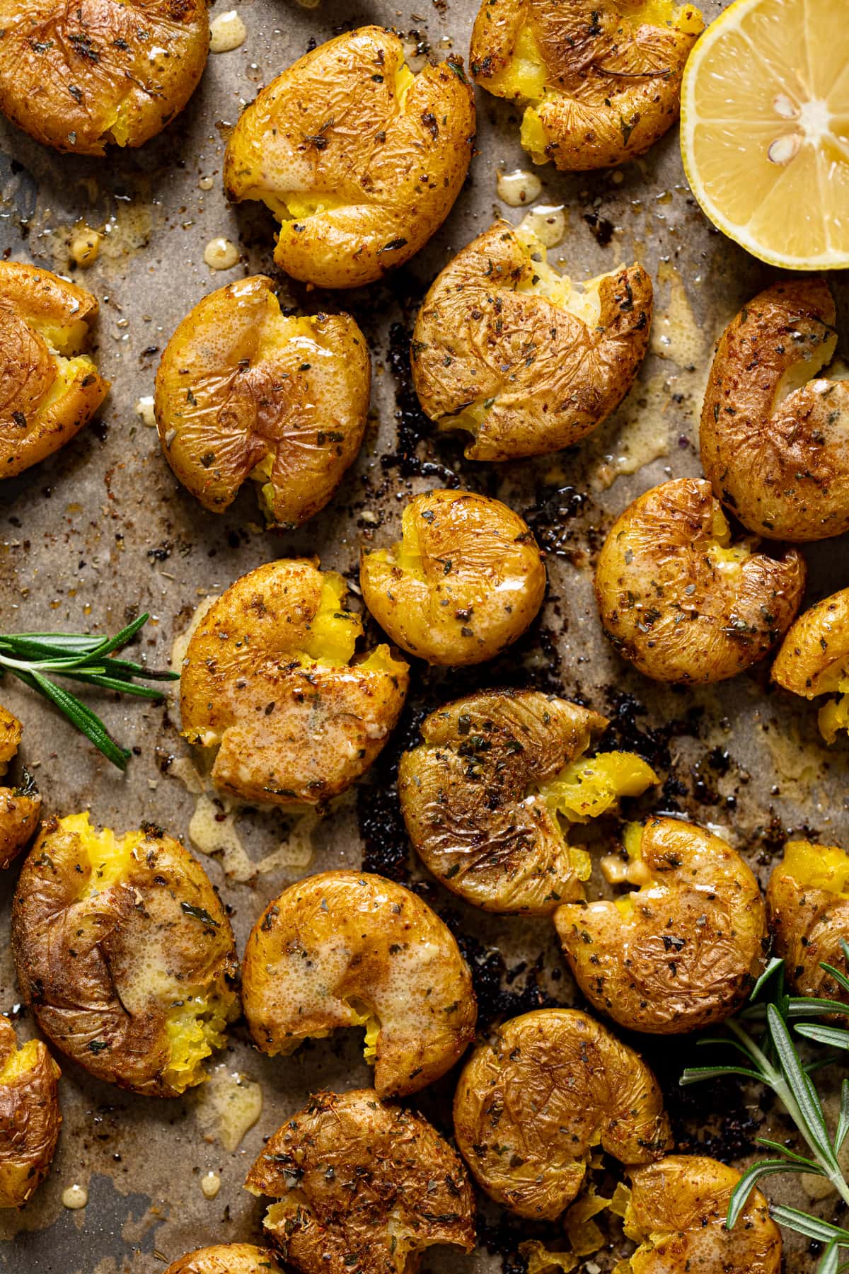 Garlic Herb Smashed Potatoes on parchment paper