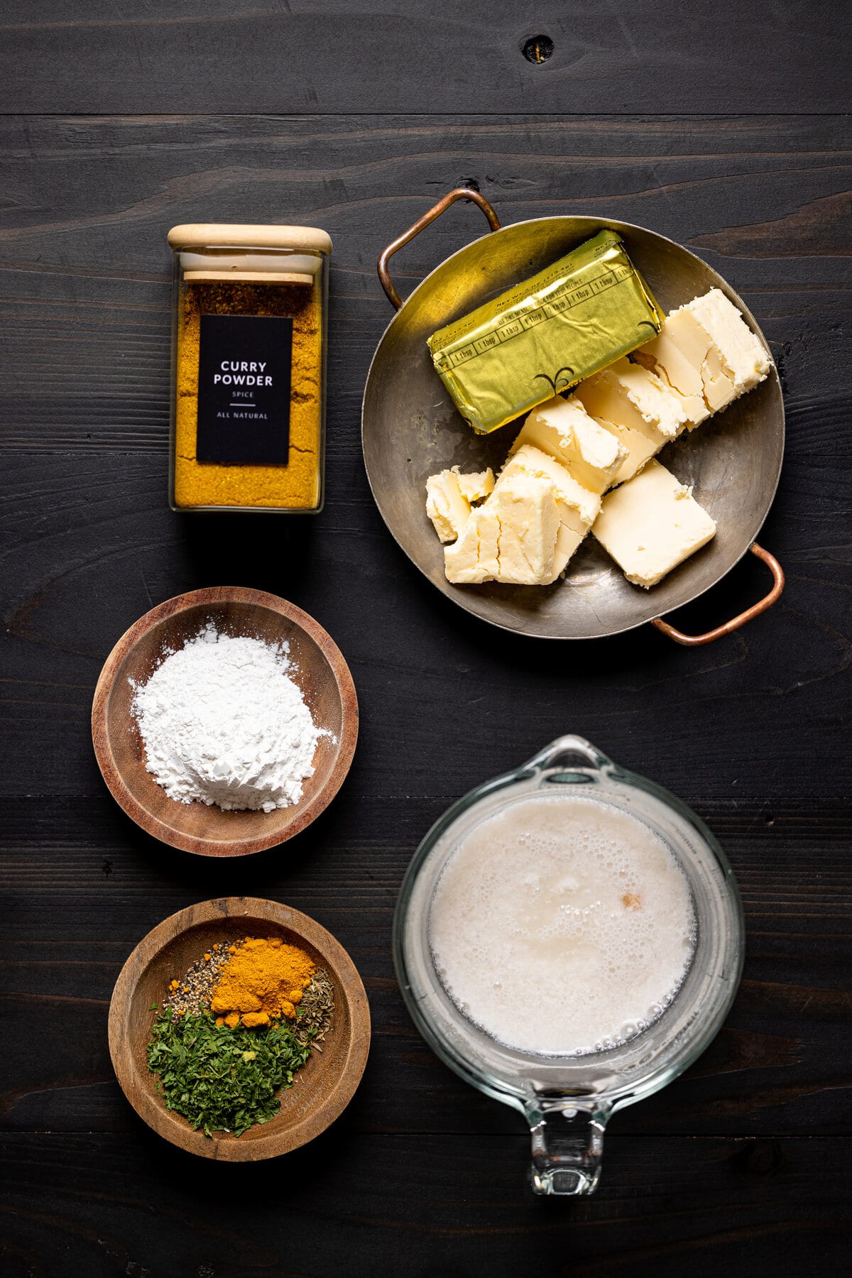 Ingredients for Vegan Jamaican Beef Patties including curry powder, spices, and vegan butter