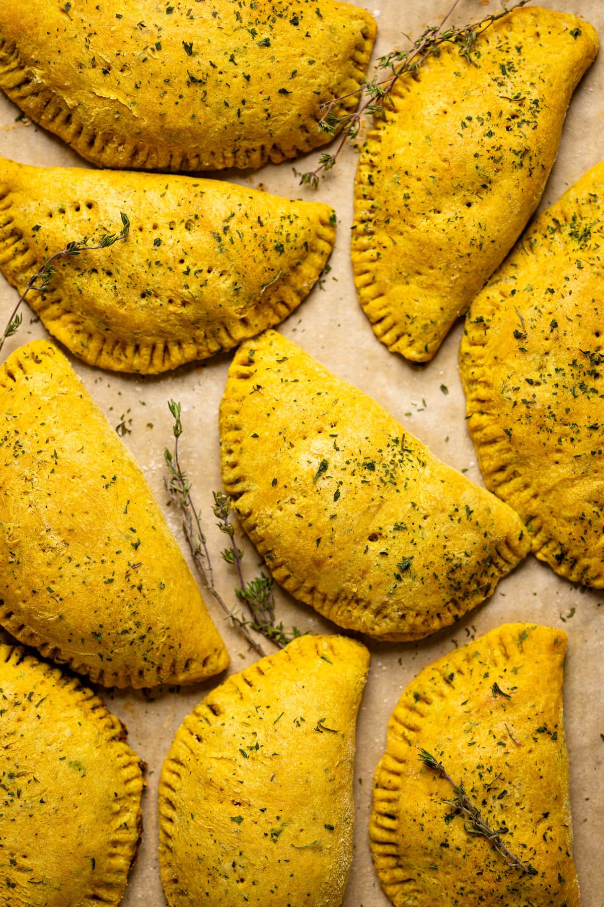 Closeup of a sheet pan of Vegan Jamaican Beef Patties