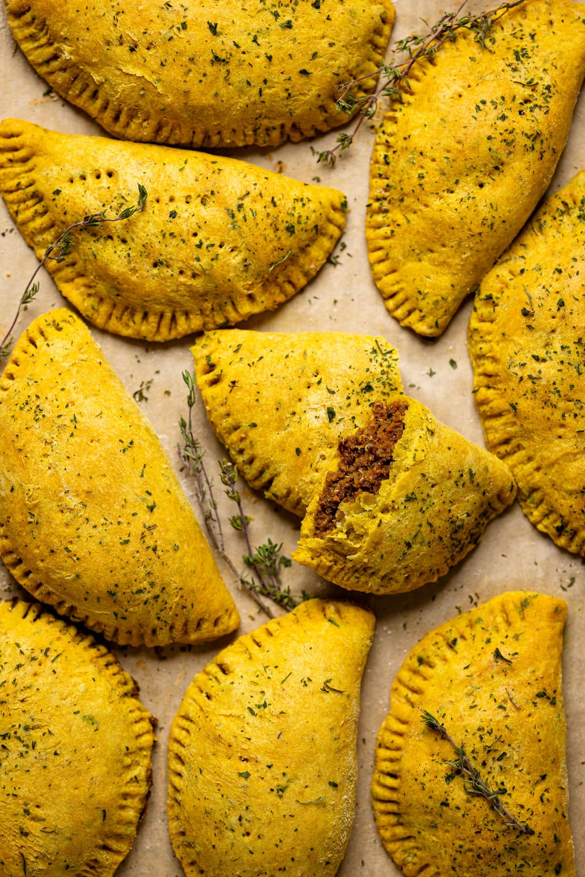 Closeup of a sheet pan of Vegan Jamaican Beef Patties