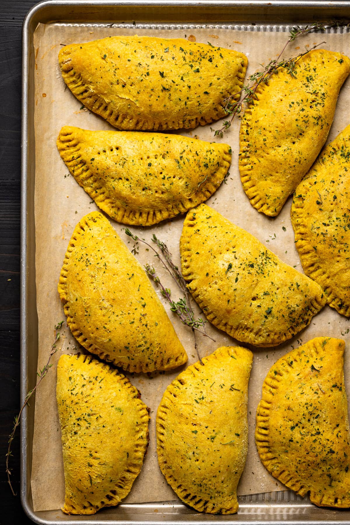 Vegan Jamaican Beef Patties on a baking sheet lined with parchment paper