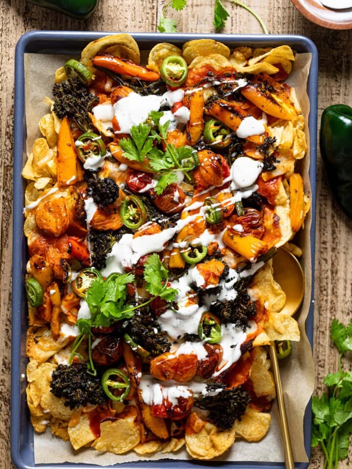 Overhead shot of a baking sheet of Meatless Ranch Kettle Chip Nachos