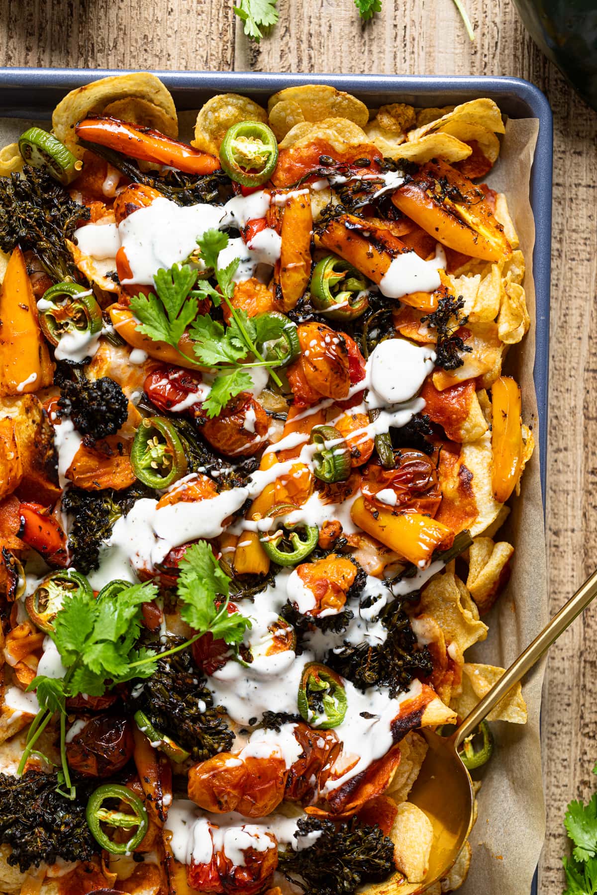 Closeup of a baking sheet of Meatless Ranch Kettle Chip Nachos