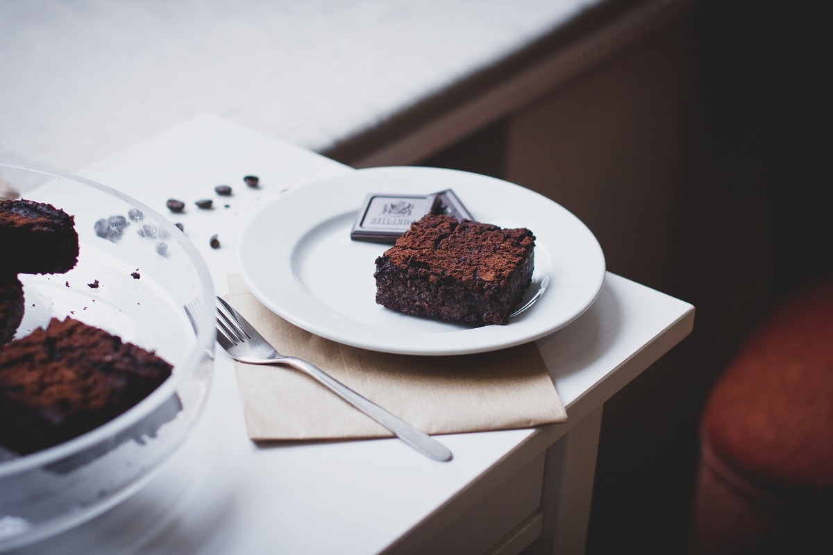 Brownie and chocolate squares on a plate