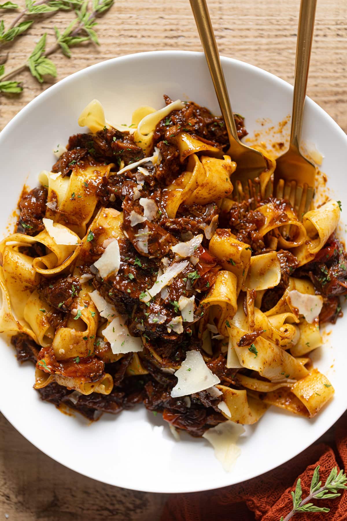 Plate of Braised Steak Ragu with Pappardelle with two forks