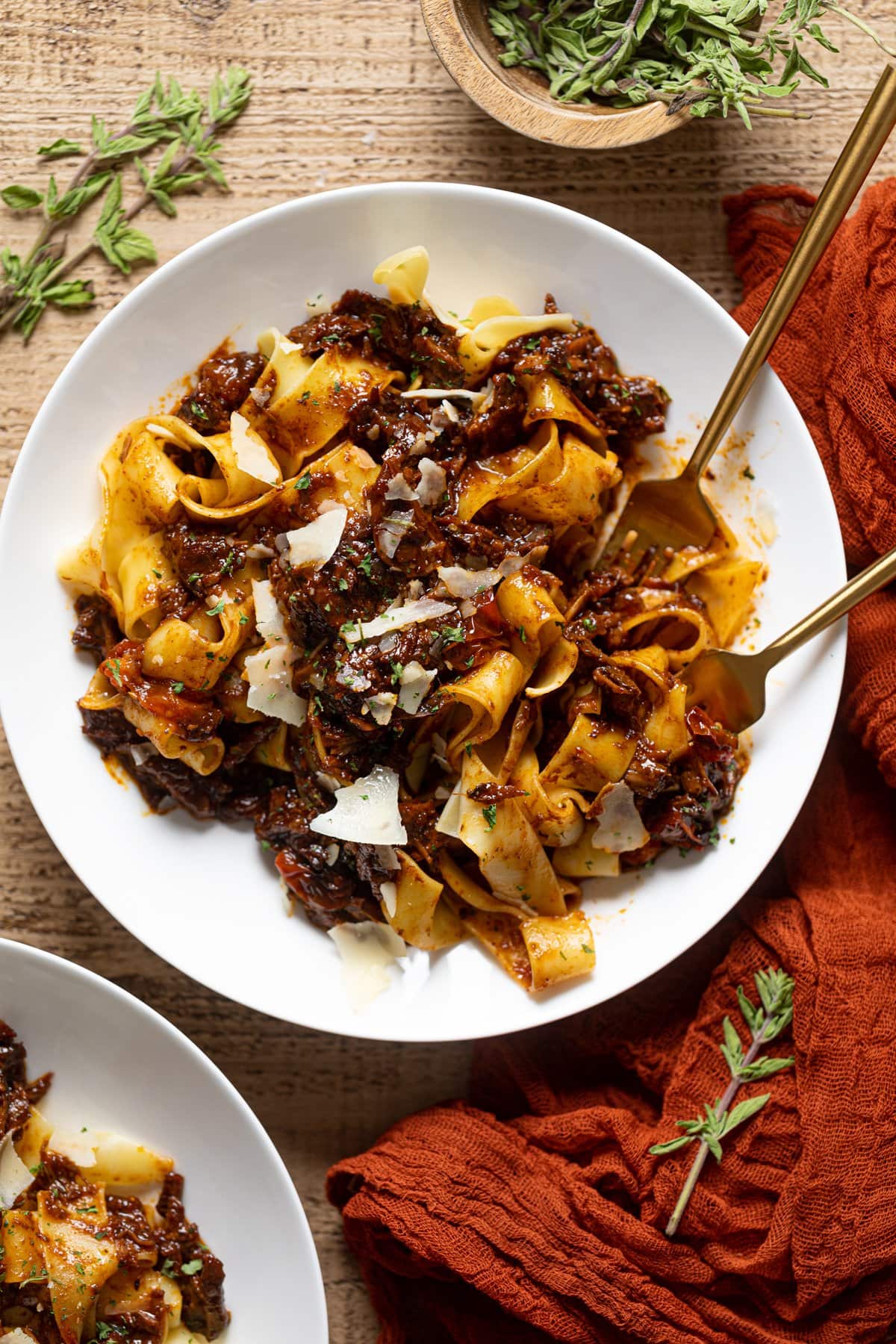 Plate of Braised Steak Ragu with Pappardelle with two forks