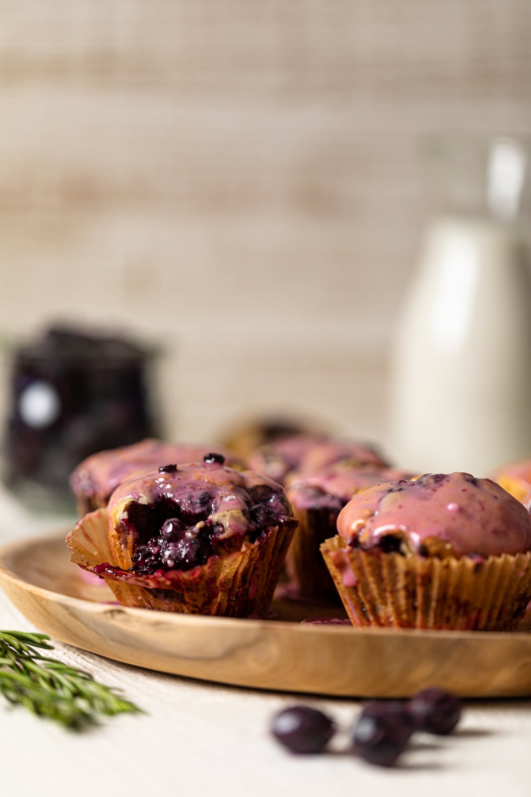Blueberry Blackberry Jam Muffins on a wooden plate